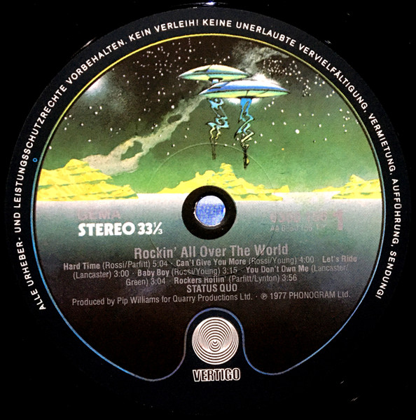Status Quo - Rockin' All Over The World (LP, Album, Bla)